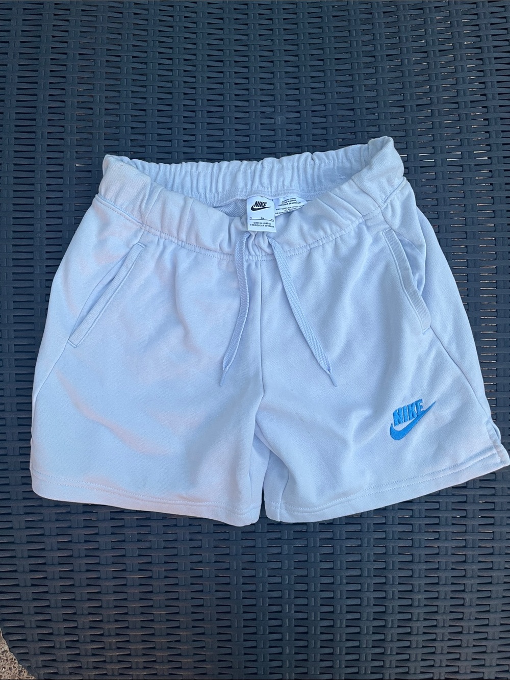 Nike Women's Light Blue Athletic Shorts with Blue Logo